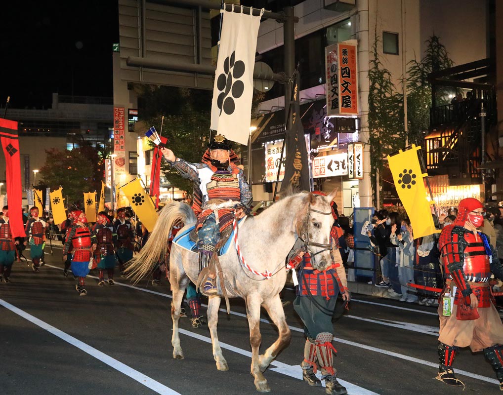 Samurai in full armour on a horse during samurai week in Yamanashi